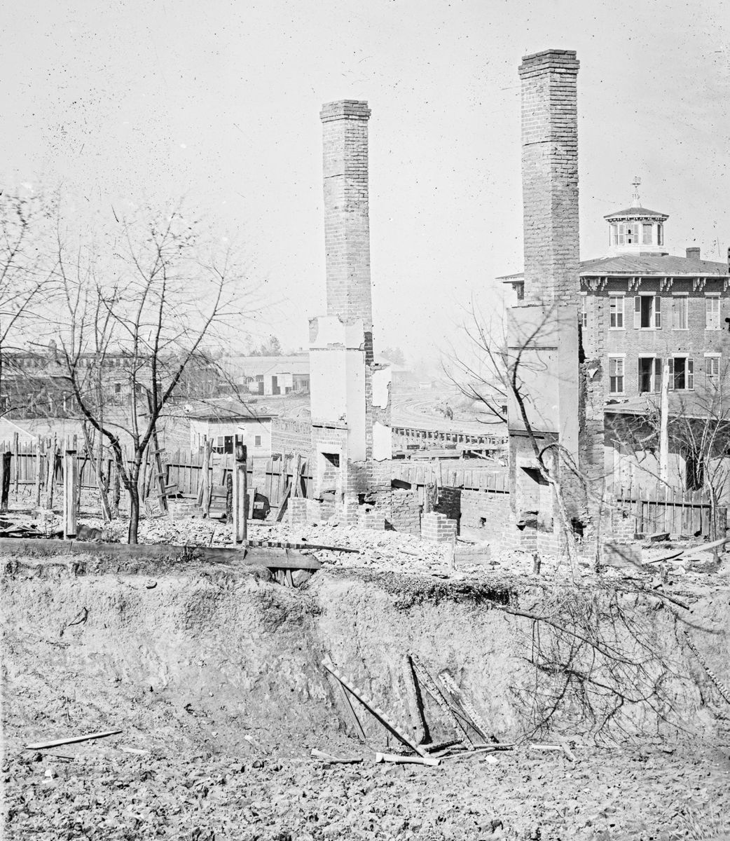 George Barnard photo shows two chimneys standing from a house that clearly was destroyed by Northern shells during the bombardment. But it could just as clearly show the wreckage of an Atlanta residence burned by Federal soldiers. (Library of Congress)