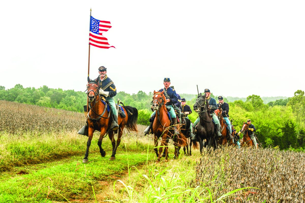 Union cavalrymen advance to the front.