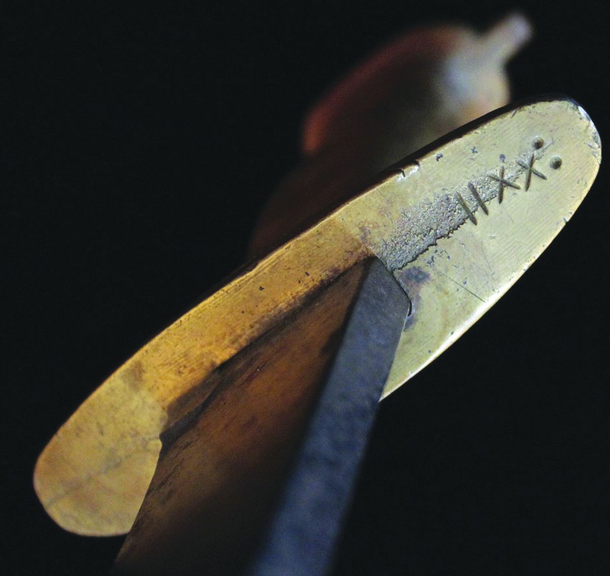 Roman numerals XXII cut into the bottom of the hilt.