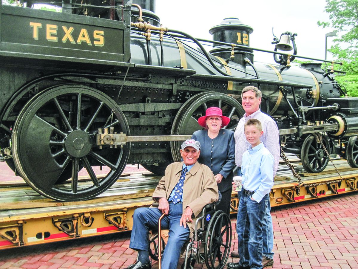 In 1927, five year-old Harper Evans was allowed to sit in the cab of the Texas when it was moved from Grant Park into the Cyclorama building. Ninety years later, Evans rode the Texas again with his family when it was moved into the Atlanta History Center, May 4, 2017.