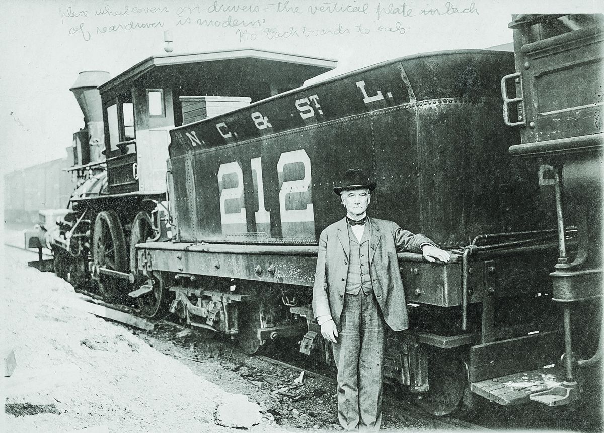 Anthony Murphy poses next to the Texas in 1907. Along with William Fuller, Murphy led the pursuit of the Andrews Raiders during the 1862 Great Locomotive Chase.