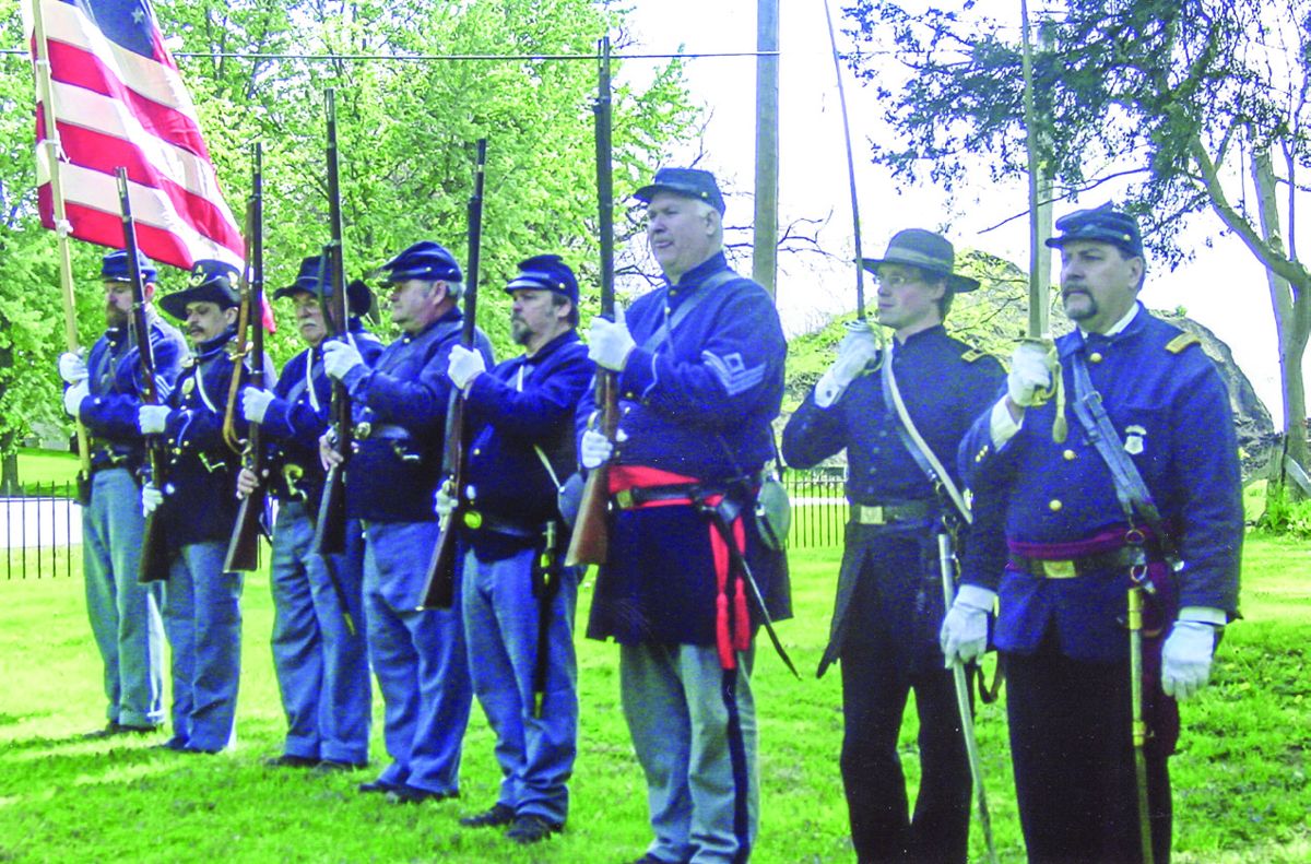 The 10th Illinois Infantry presents arms.