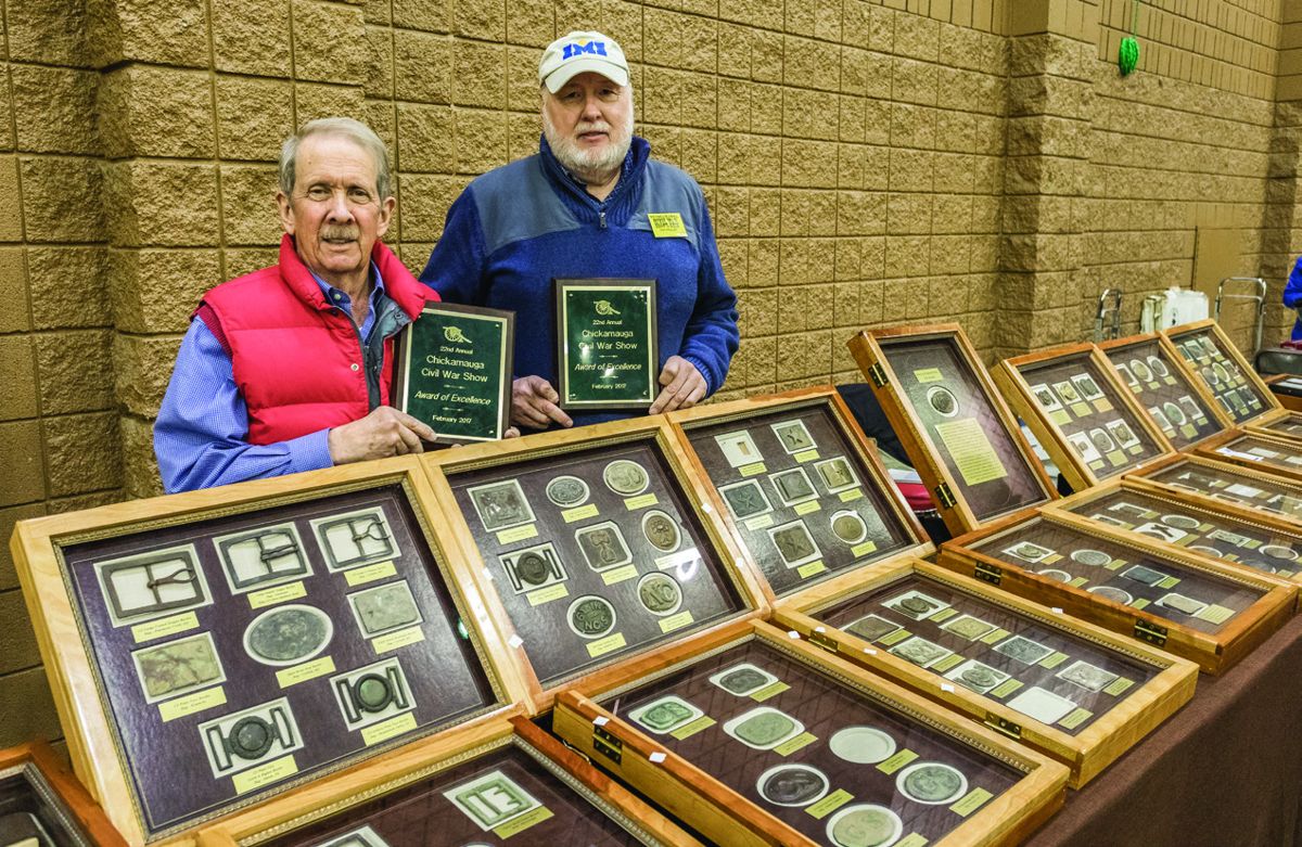 William Blackman and Don Phillips with their award wining display of Confederate and State belt buckles.