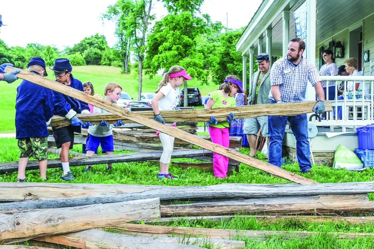 Children build a fence as part of a Generations Program event to learn about civilian life surrounding the Battle of Antietam. The event was held on June 18, 2016 by the Civil War Trust and the Heart of the Civil War Heritage Area. (Civil War Trust, Civilwar.org)