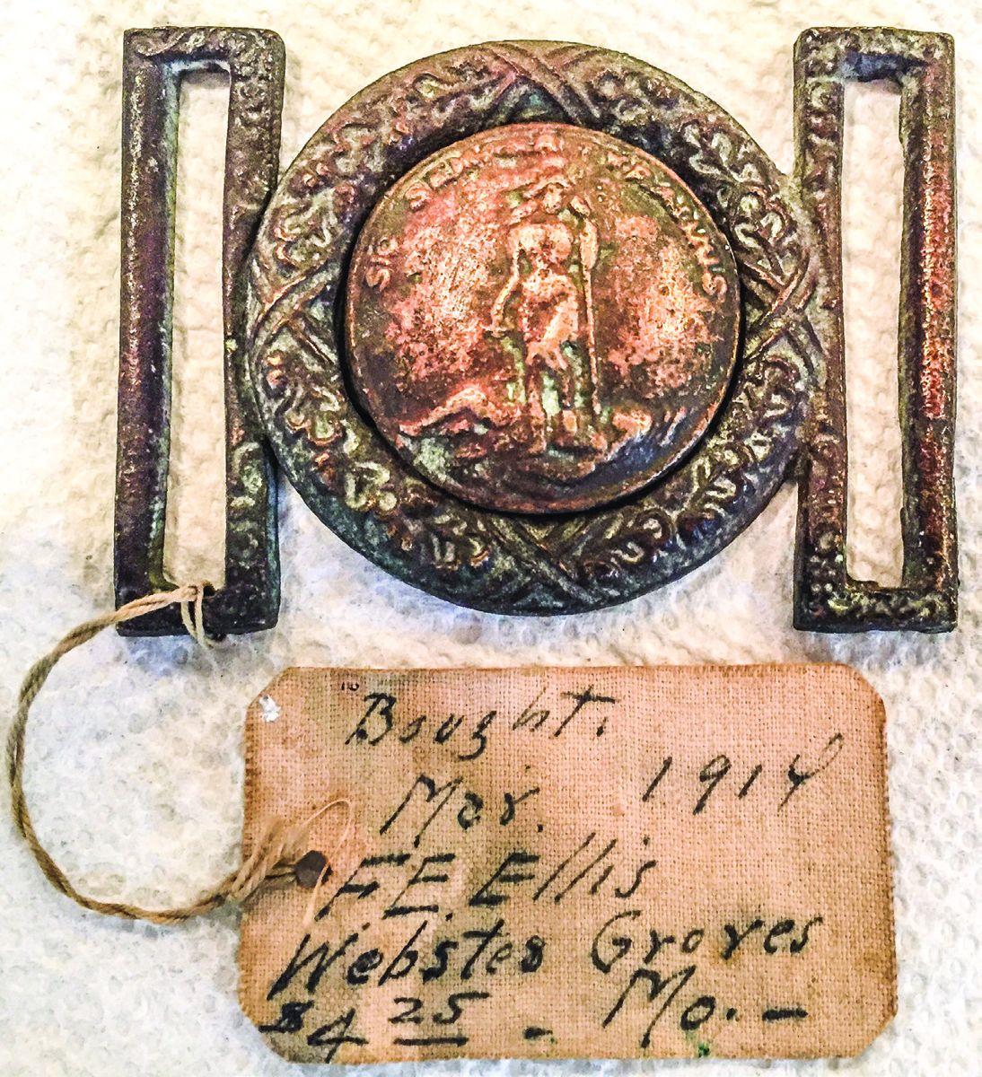 I love the tag, but this buckle is an early reproduction made for the tourist trade, worth about $25.