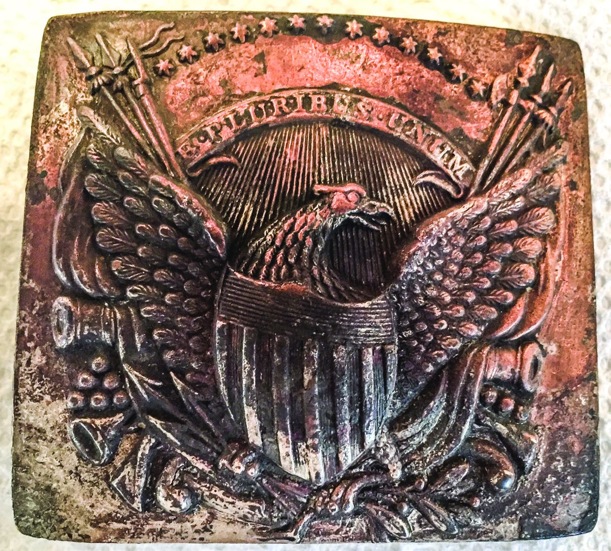 Originally totally silver-plated, this 1818 pattern eagle buckle was made with high copper content, as can be seen in the red coloration of the metal.