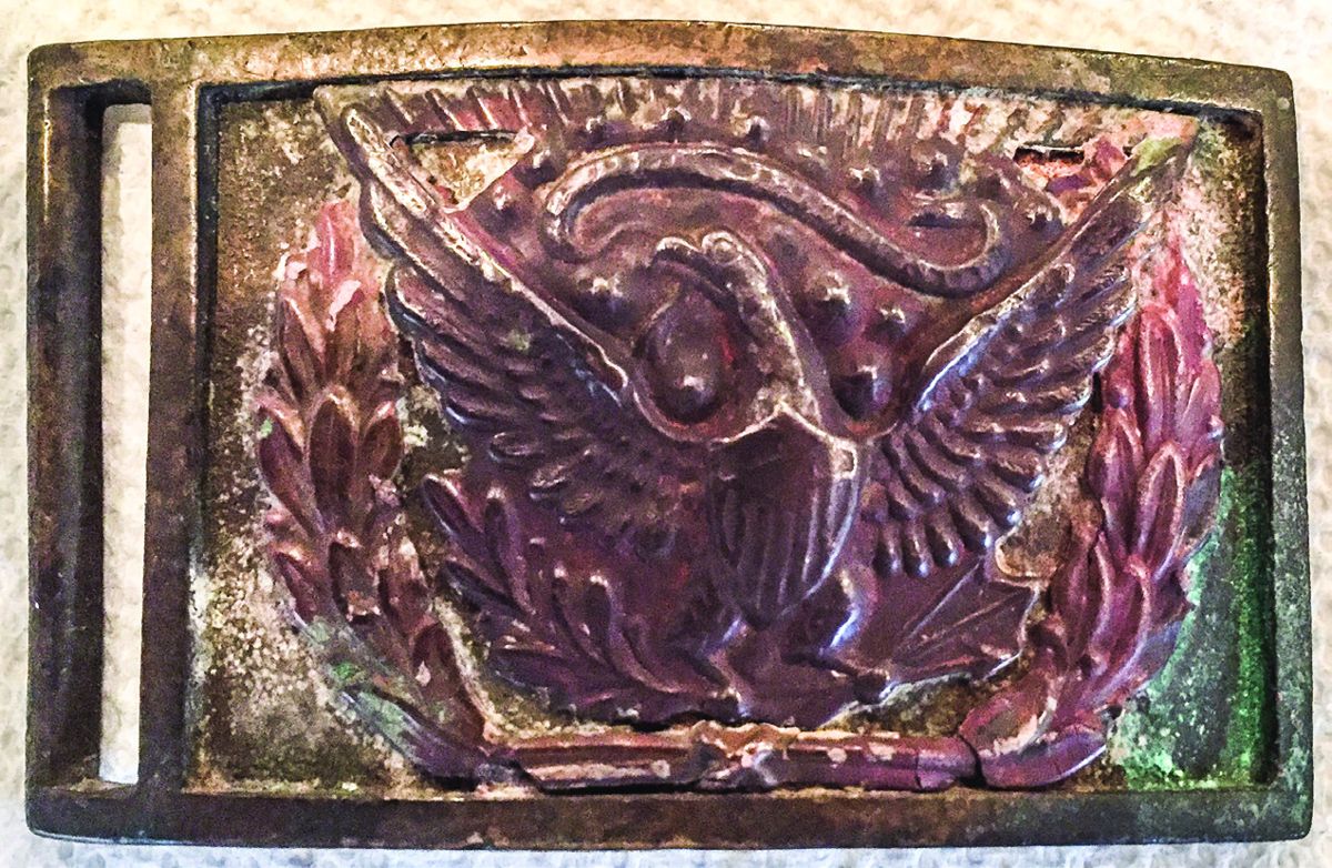 This particular sword belt plate is rare in that it is marked “Allegheny Arsenal” on verso, but appears to be an early battlefield pickup as there is much corrosion and discoloration to the wreath. It should still sell for a premium, around $300.