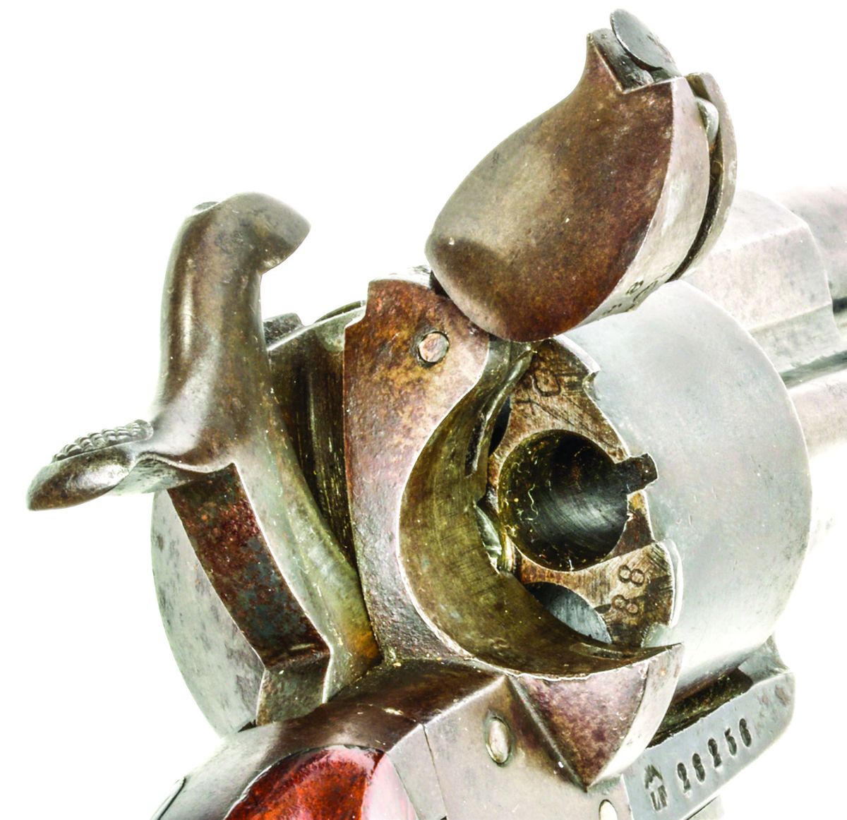 View of M-1854 revolver #28256 showing the upward swinging, hinged loading gate in the open position. The mating number “88” on the rear face of the cylinder, is also marked on most of the gun’s major components. These matching mating marks are the equivalent of the serial numbers found on most major parts of a Colt percussion revolver.