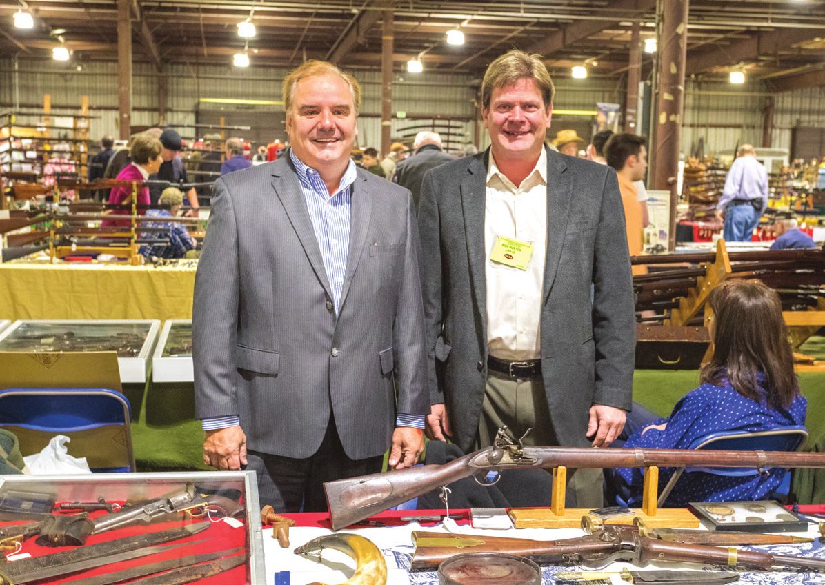 George Juno, owner of Le Juneau Gallery LLC, Fort Pierce, Fla., with Rick Burton, owner of Carolina Collectors Civil War Relics, Kernersville, N.C.