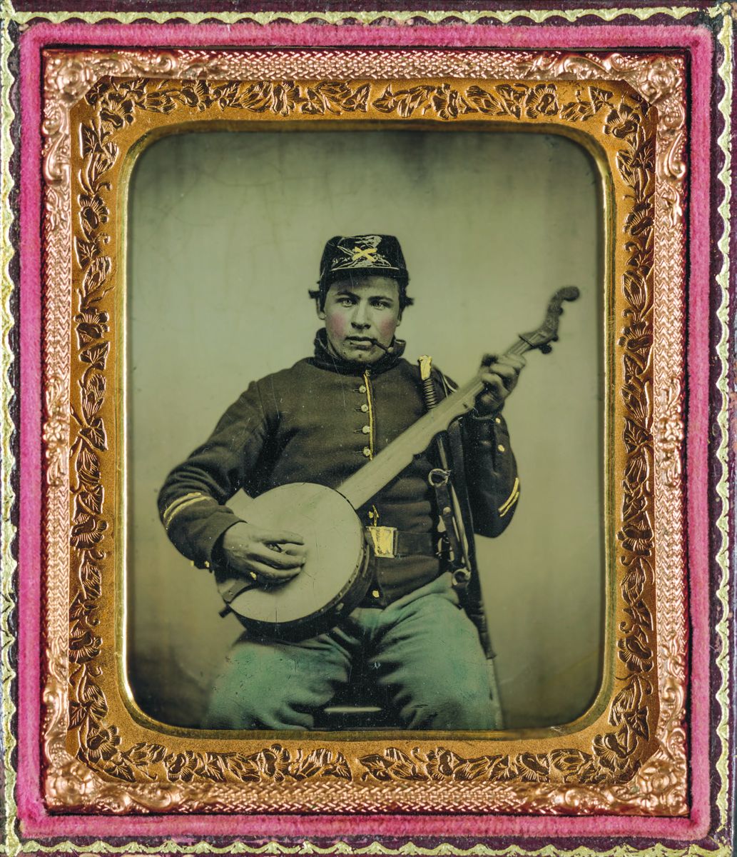 Unidentified soldier in Union cavalry uniform with banjo, sword, (Library of Congress)