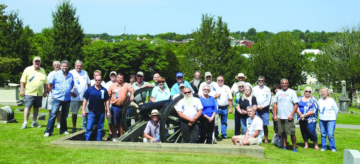 Member of the Morgan’s Men Association post by one of Morgan’s cannon in the Elizabethtown Cemetery. The group followed the General around Bardstown and Elizabethtown, Kentucky, during their annual reunion.