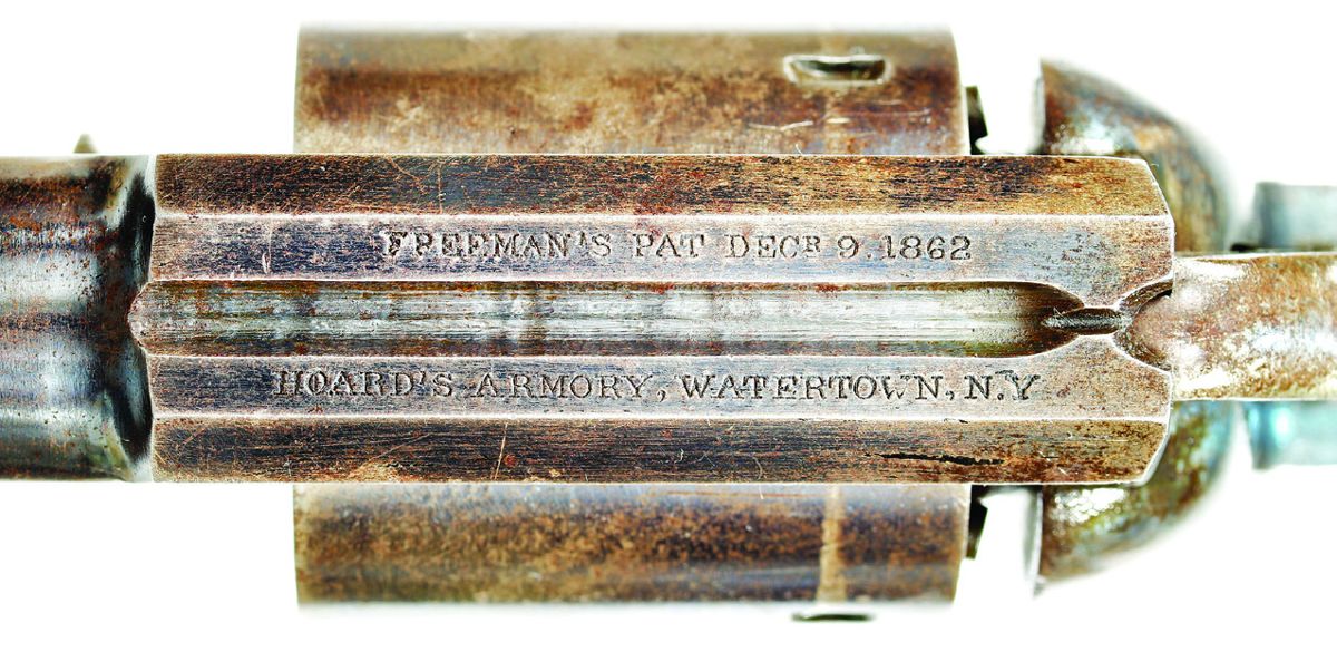 Standard topstrap markings on a Freeman Army revolver.