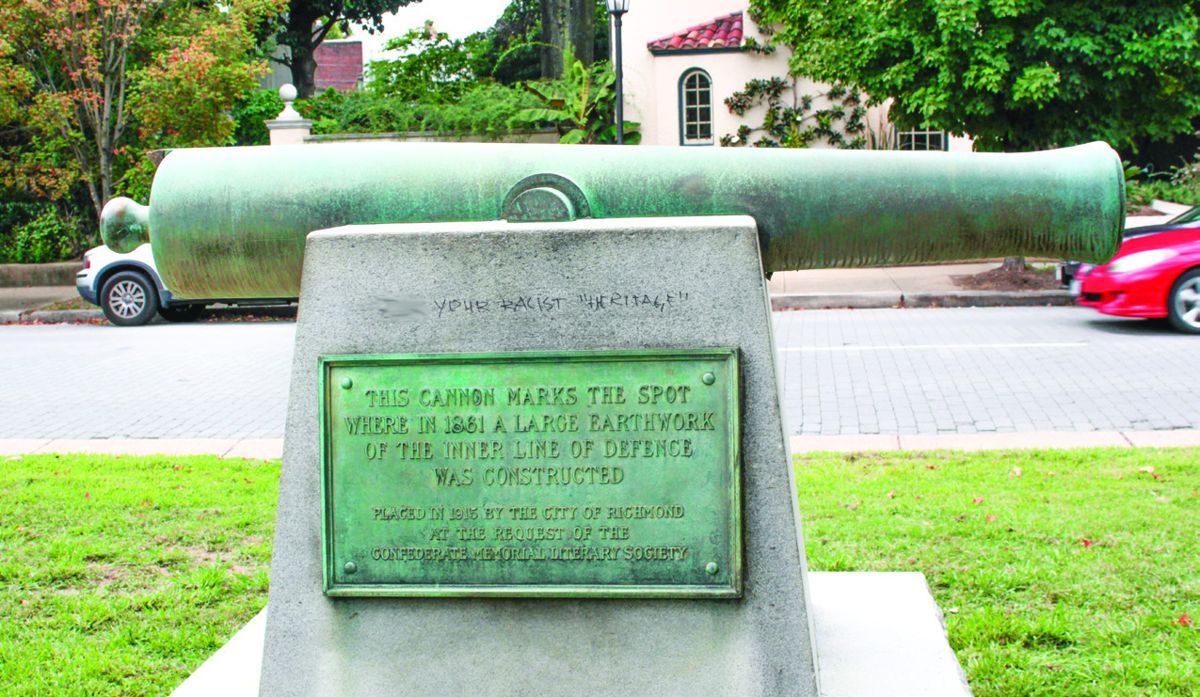 Bronze 12-pounder Napoleon cannon marking the spot where a large earthwork of the inner line of defense for Richmond was constructed in 1861. Vandals wrote profanity on the pedestal.