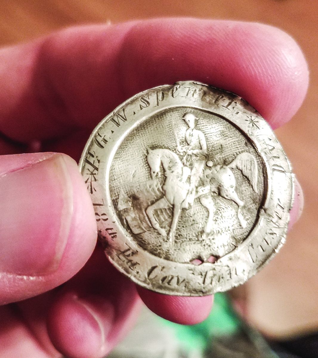Quarter to the left of the I.D. pin for scale.