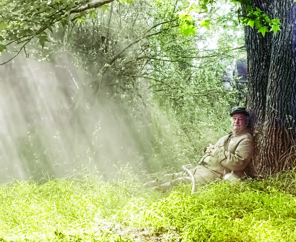 OTR Russell Dashiel, portraying a Confederate officer, rests in the woods after a battle. (Tom George Davison)