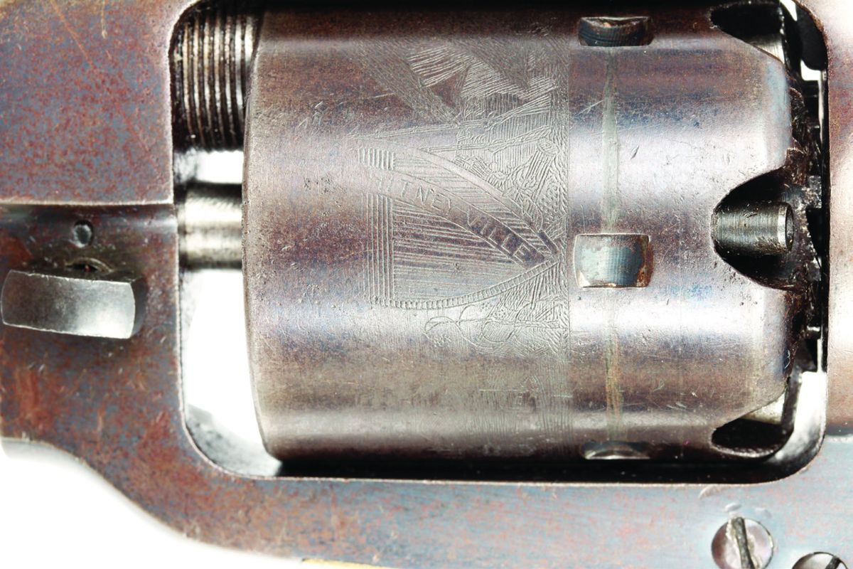 2nd Model, 4th Type cylinder scene with “Whitneyville” on the shield.