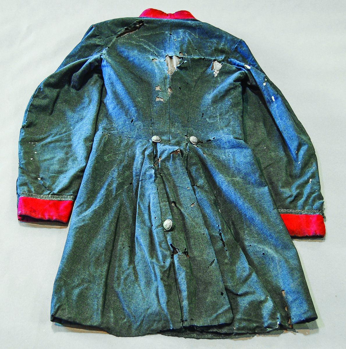 Coat, back, before conservation.