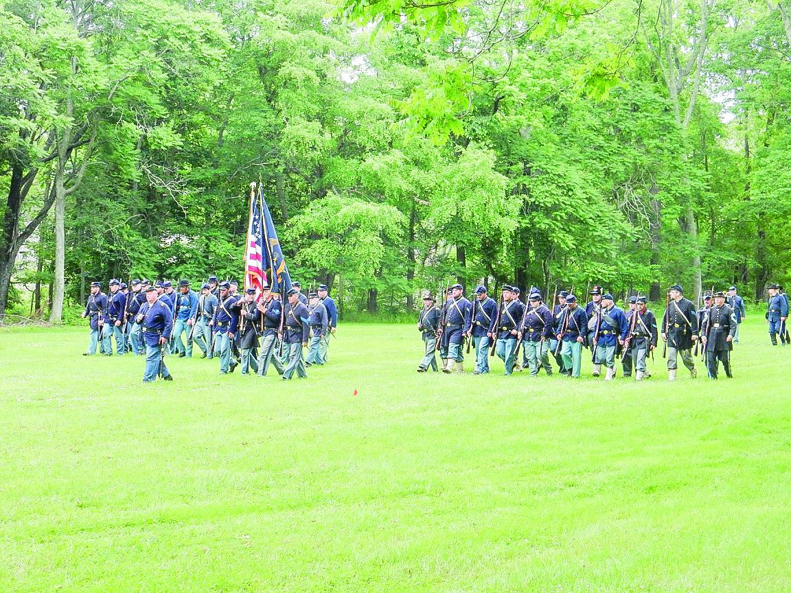 Union forces advance outside town. Julie Marin Grant)