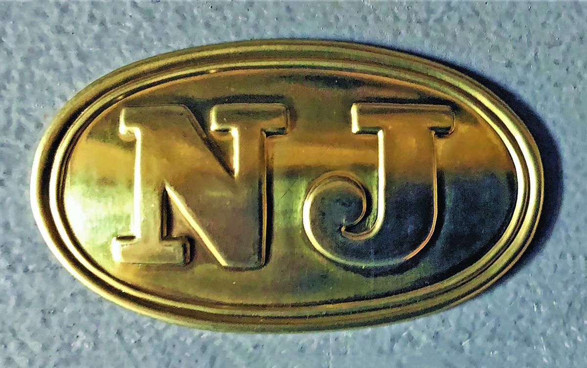 NJ belt buckle, 19th century. (Joseph Bilby)