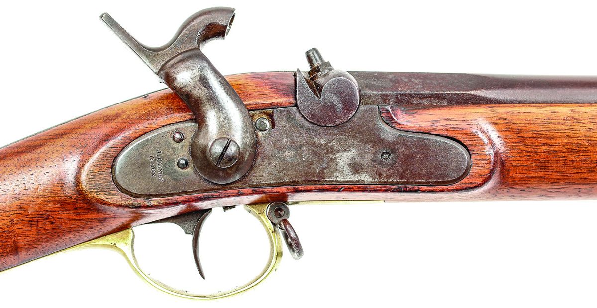 Lock of a J. Henry rifle, showing markings behind the hammer.