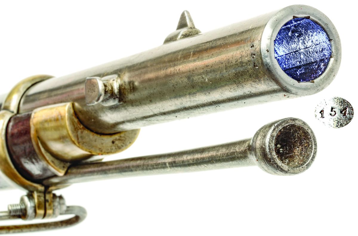 Muzzle of a J. Henry “Saber Rifle” showing the 4-groove rifling, ramrod, and saber bayonet lug, inset image shows the numbering on the gun’s muzzle to mate it with the bayonet.