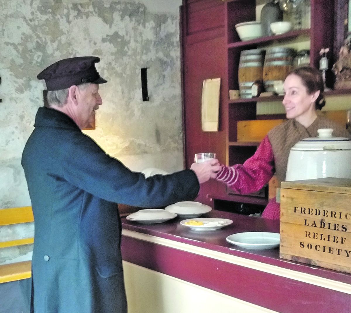 After the Storm Event. Edwin Powell gets a beverage from Christina Herold in the White Hall Tavern in Harpers Ferry.