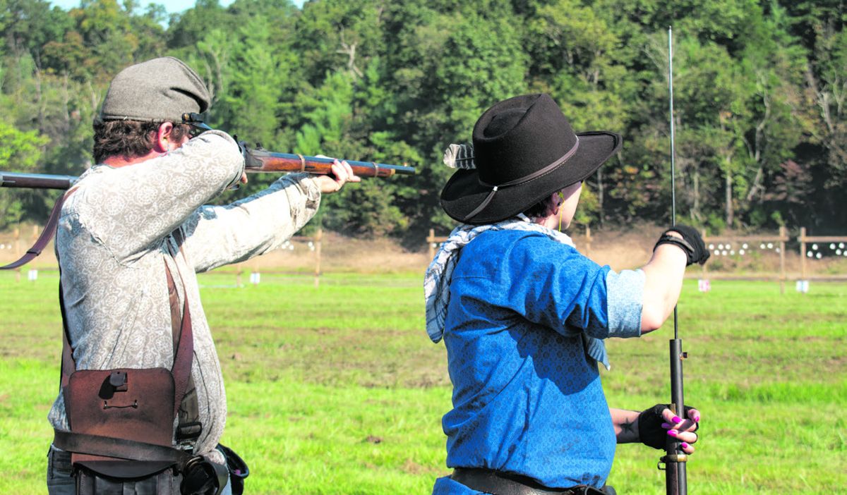 Safety is a priority and proper gun handling is a must when loading and firing these guns. Each line position is required to have a safety officer and a line judge present. (Ericka Hoffmann)