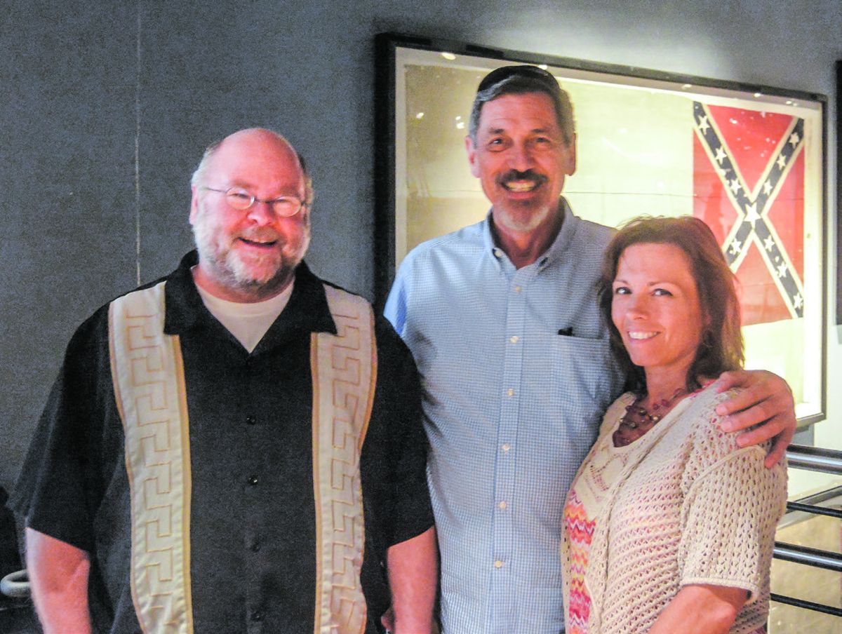 Curator Jeff Seymour with Volunteers John and Rebecca Rice.