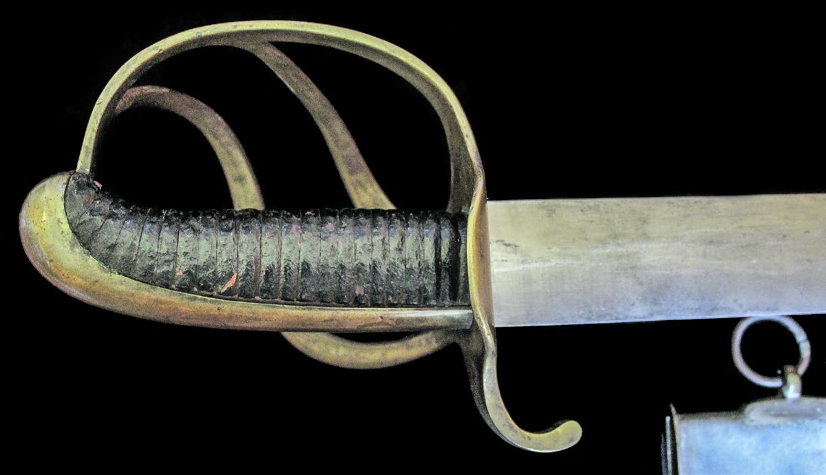 Left side of the sword’s hilt.