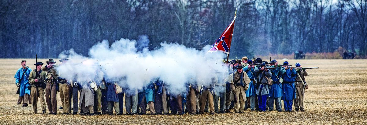 Confederate infantry fires at oncoming Federals. (Buddy Secor)