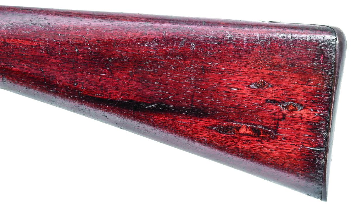 Close up of the reverse of a Whitney Enfield Rifle Musket buttstock, showing flaws in the wood that would certainly “not pass Government inspection.”