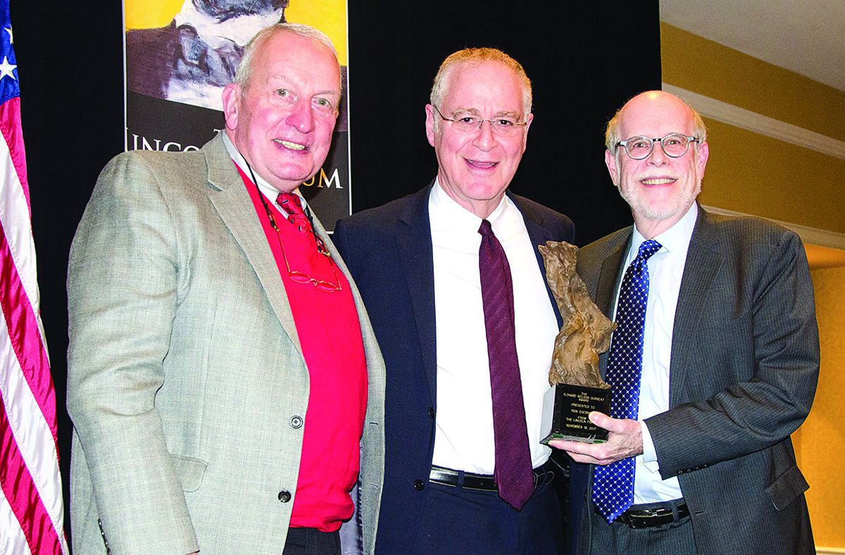 Harold Holzer (R) and Frank Jim Williams (L) present 2017 Richard Nelson Current Award of Achievement to author Ron Chernow (center).