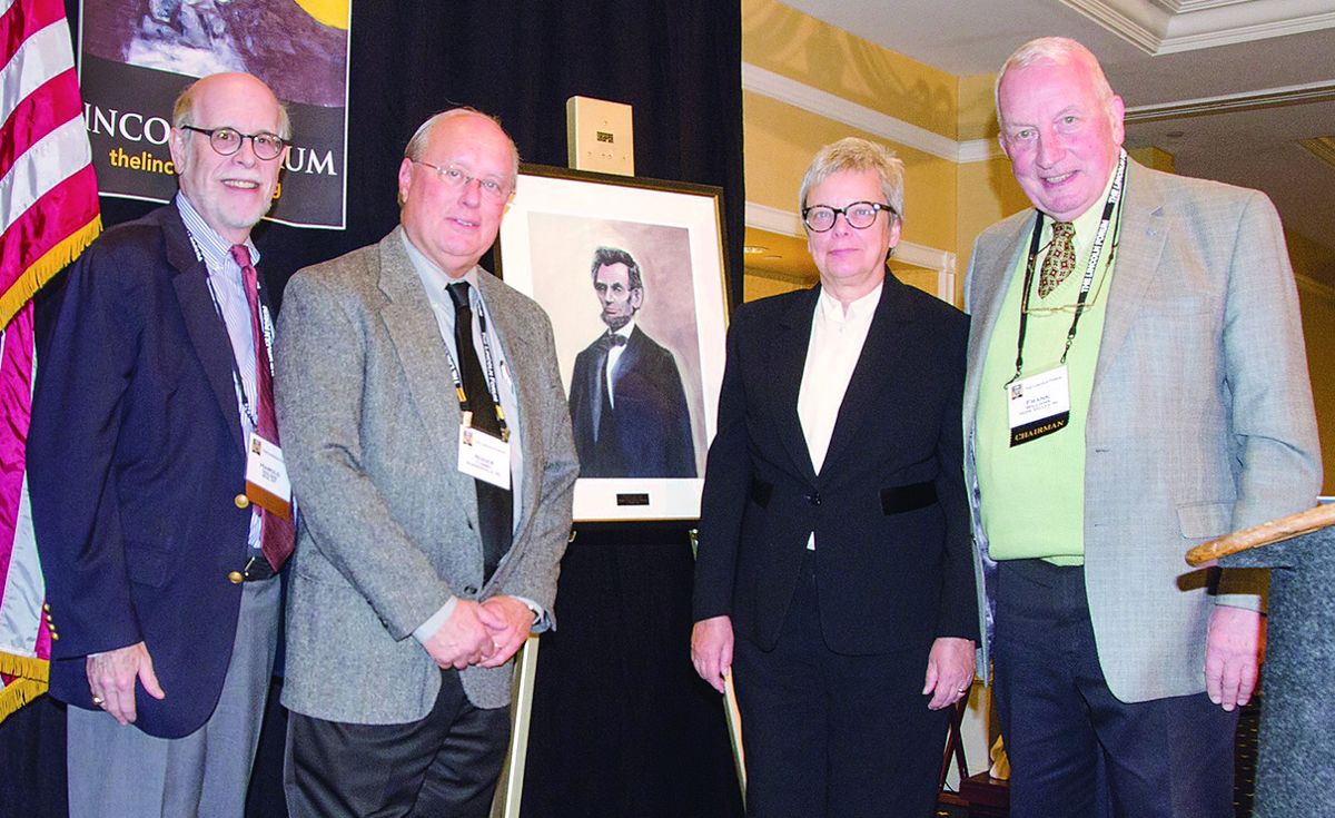 Vice Chairman Harold Holzer (L) and Chairman Frank Jim Williams (R) present Wendy Allen Award to Judge Roger B. Crosbey of the Friends of the Lincoln Foundation. Artist Wendy Allen joins them.