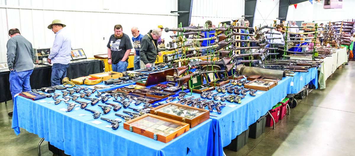 Vin Caponi’s large assortment of firearms for sale at the show.