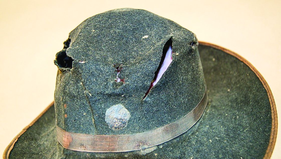 Slice in crown of hat, before treatment.