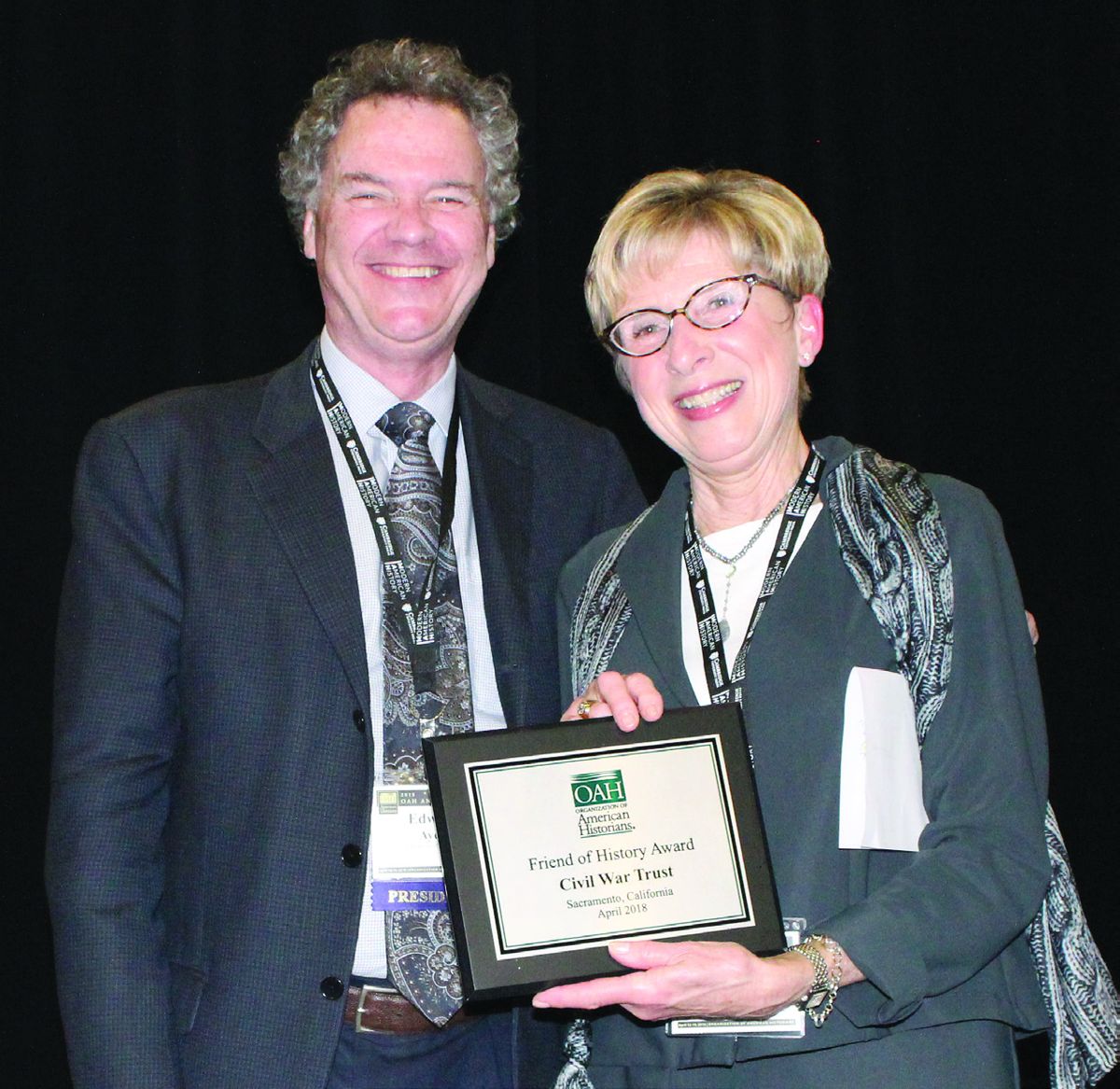 Dr. Mary Munsell Abroe (R), a Civil War Trust board member, accepts the Friend of History Award from 2017-18 OAH President Edward L. Ayers (L) in Sacramento, Calif. (Sally Hanchett/OAH photo)