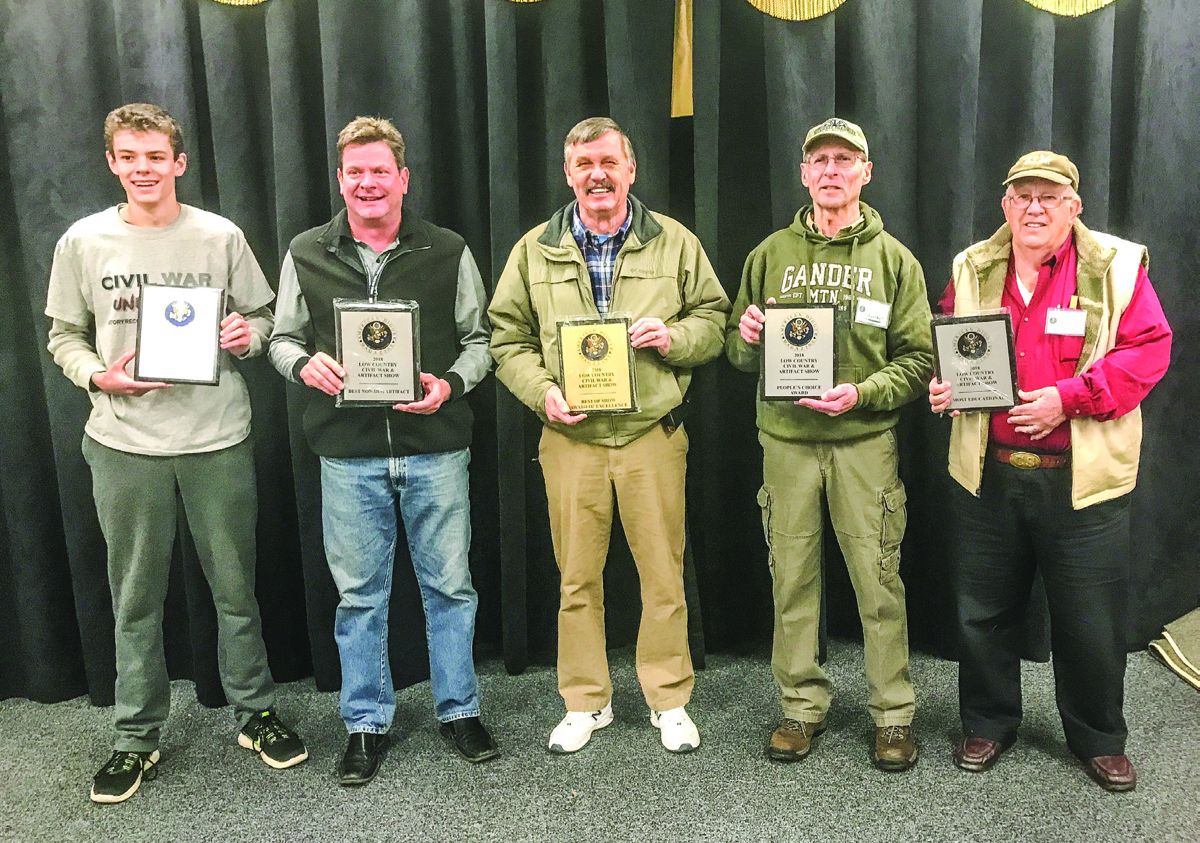 Show awards were given as follows: (Left to right) Best Dug Artifact: Riley Bryant, (Union identification disc, his first find ever); Best Non Dug Artifact: Rick Burton, Colt Dragoon revolver; Award of Excellence/Best of Show: Jerry Kirkland, South Carolina Brass; People’s Choice: Mick Aderholt, Southern Soldiers – A Tribute; Most Educational: Charlie Harris, Lookout Mtn. Cave Rifles.