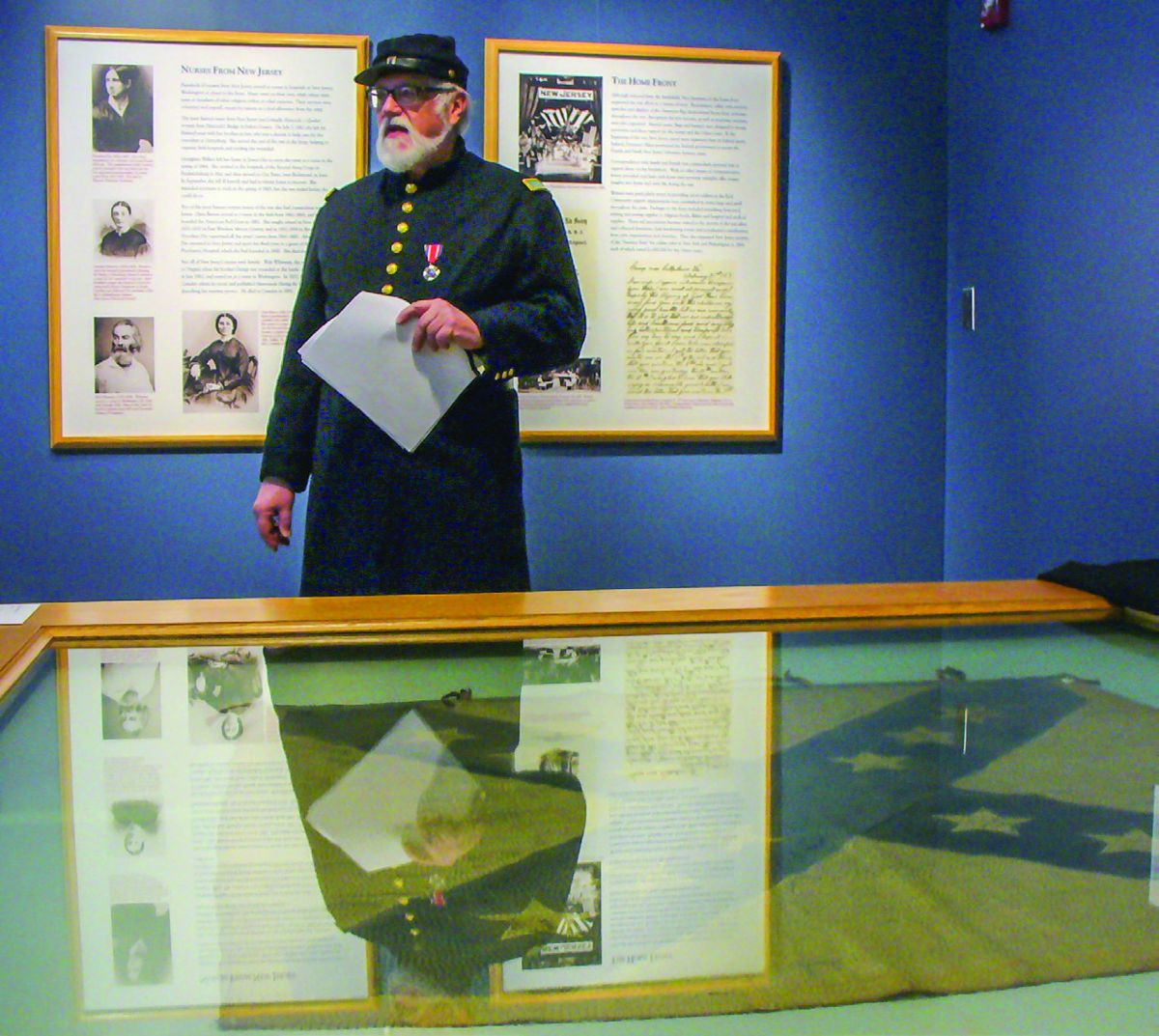 Dr. Martin tells the history of the capture of the Confederate battle flag on display in the flag collection.