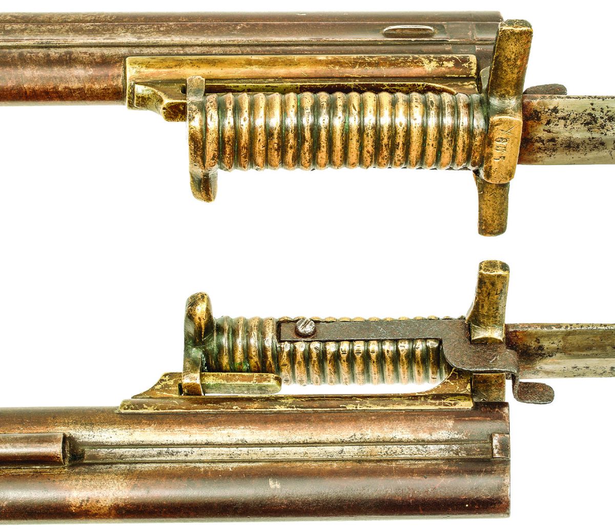 Close up of cape gun’s muzzle area showing the bayonet lug with bayonet attached.