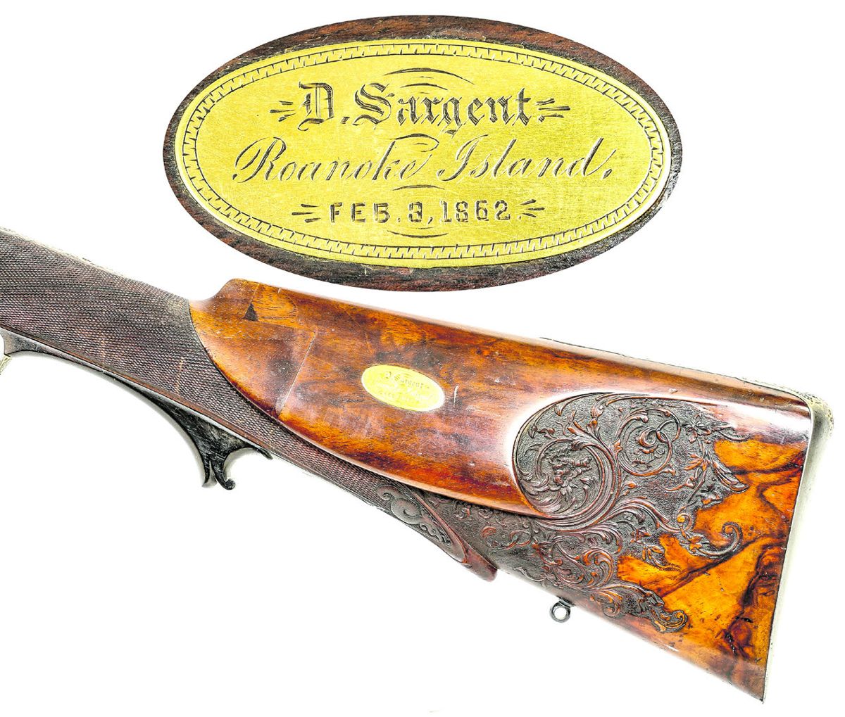 Obverse lock of the shotgun showing the ornate decoration of