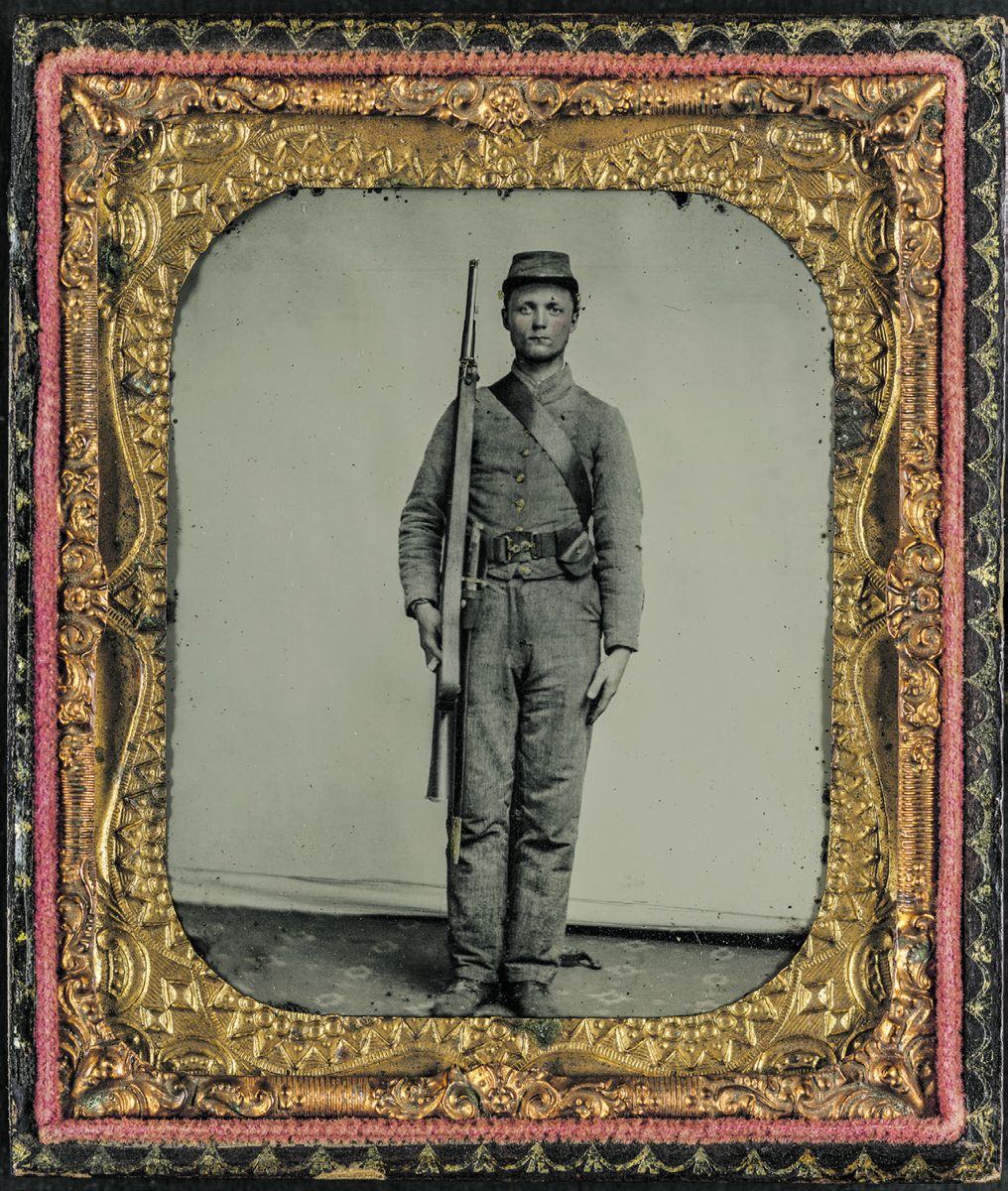 Unidentified soldier in Confederate uniform and snake belt buckle with Enfield rifle and saber bayonet. (Liljenquist Family Collection of Civil War Photographs. Library of Congress)