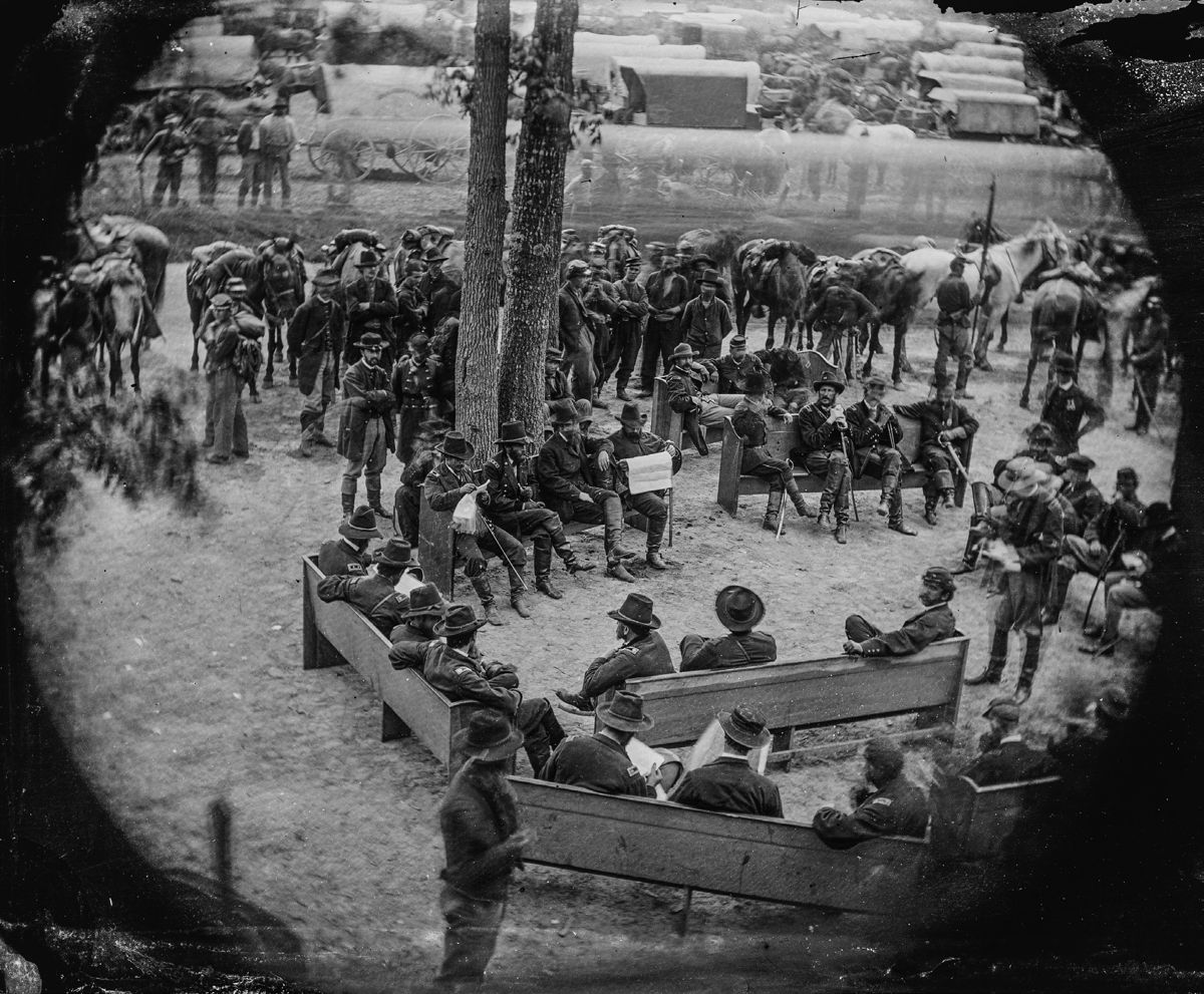 Massaponax Church, Va., “Council of War”- Gen. Ulysses S. Grant, Gen. George G. Meade, Assistant Secretary of War Charles A. Dana, and numerous staff officers. (Library of Congress)
