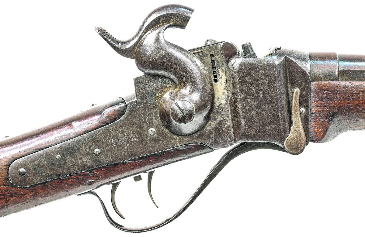 Close up of receiver of Berdan Sharps Rifle, showing the Lawrence Patent Pellet Primer system and the adjustable double-set triggers. The locks were marked with C. Sharps patent information at the rear and with the Lawrence Primer patent information behind the hammer.