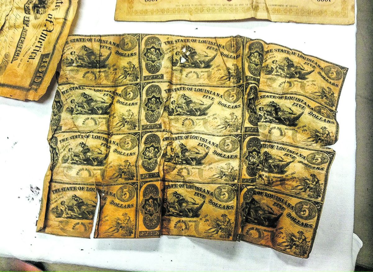 The State of Louisiana $5 currency sheet.