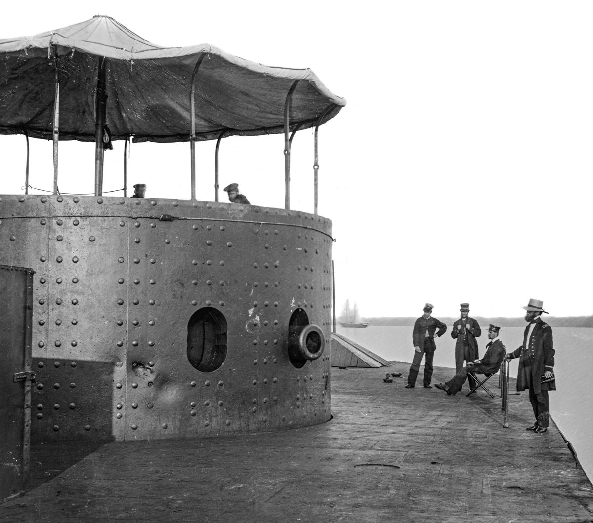 Photo of the USS Monitor shows the light damage caused to the turret of the ironclad during the fight with the Confederate ironclad CSS Virginia, March 9, 1862, at the Battle of Hampton Roads-the first battle between two ironclad warships. The port side XI-inch Dahlgren shell gun is the one visible in the photograph and the same gun pictured in the tank. (Library of Congress)