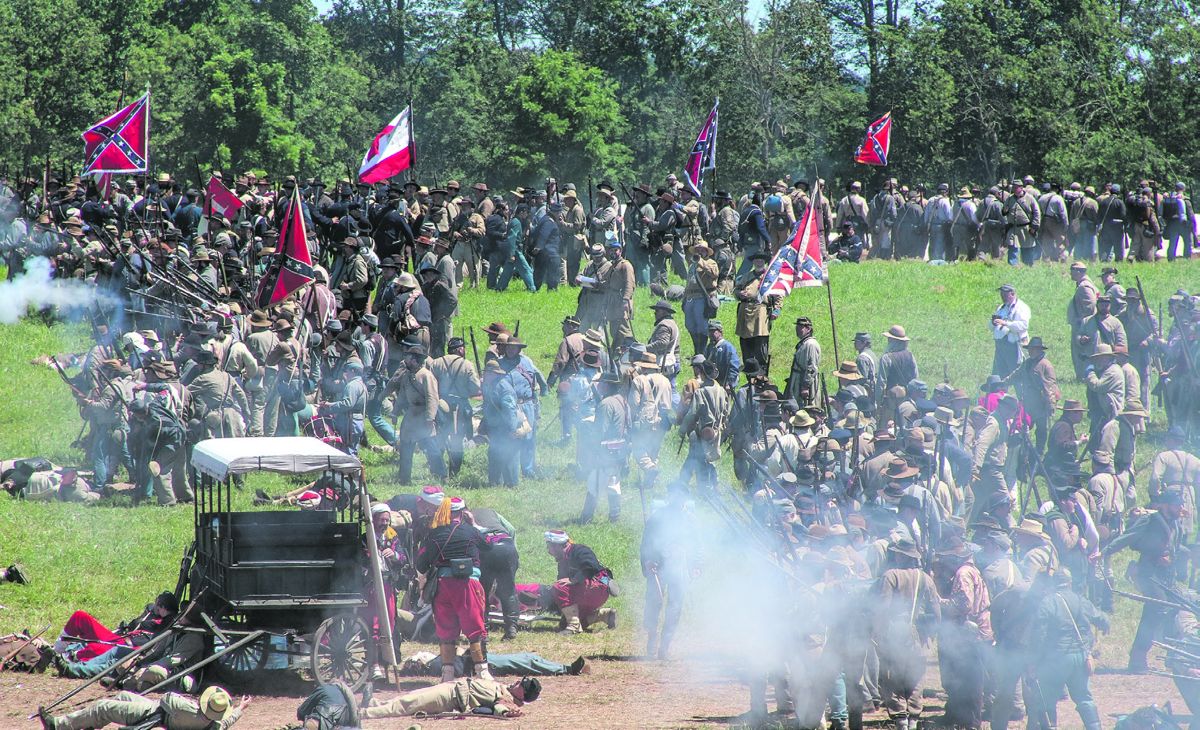 A reenactment of Zouves acting as an ambulance crew while the battle rages on around them.