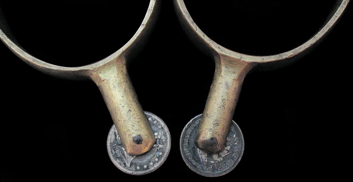 This pair of spurs uses two, 1860, New Orleans mint quarters as rowels, though very circumstantial, this points to a deep South origin.