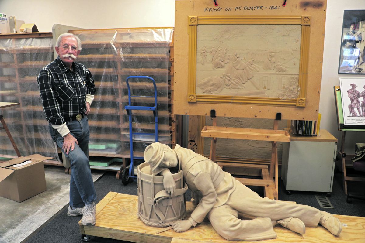 Nationally recognized sculptor Gary Casteel in his studio with some of his sculptures.