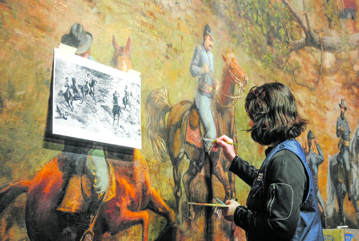 Nancy Livengood retouches the figure of Captain Frederick Whitehead, Assistant Adjutant General of the XV Corps, using high-resolution copies of 1886 photographs of the painting. There are 24 U.S. officers identified by name in the cyclorama but no Confederate officers are identified.
