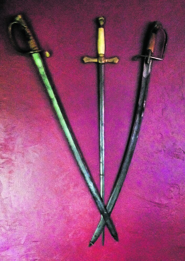 Three swords discovered in a home purchase; a very nice home warming gift from the past owner.